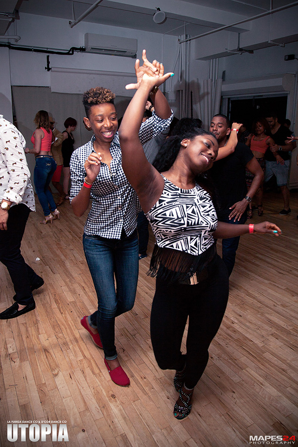 couple social dancing bachata at utopia