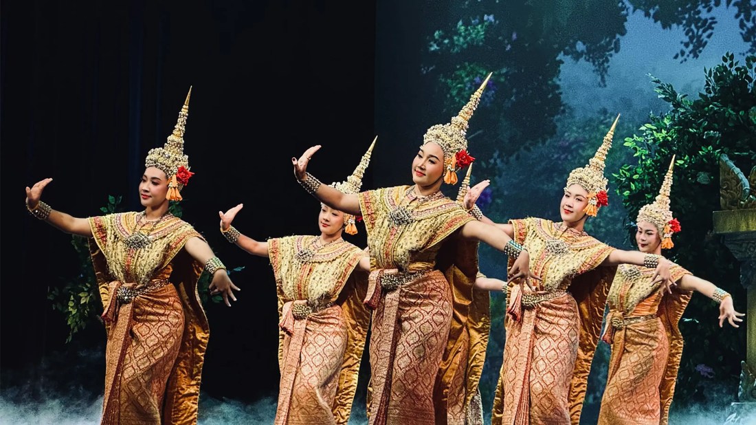 dancers in traditional thai costumes